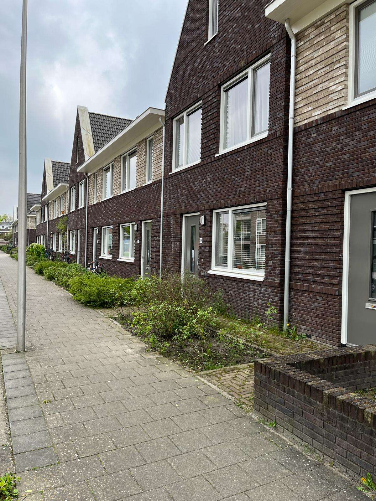 Burenkorting schilderwerk 8 woningen op rij!